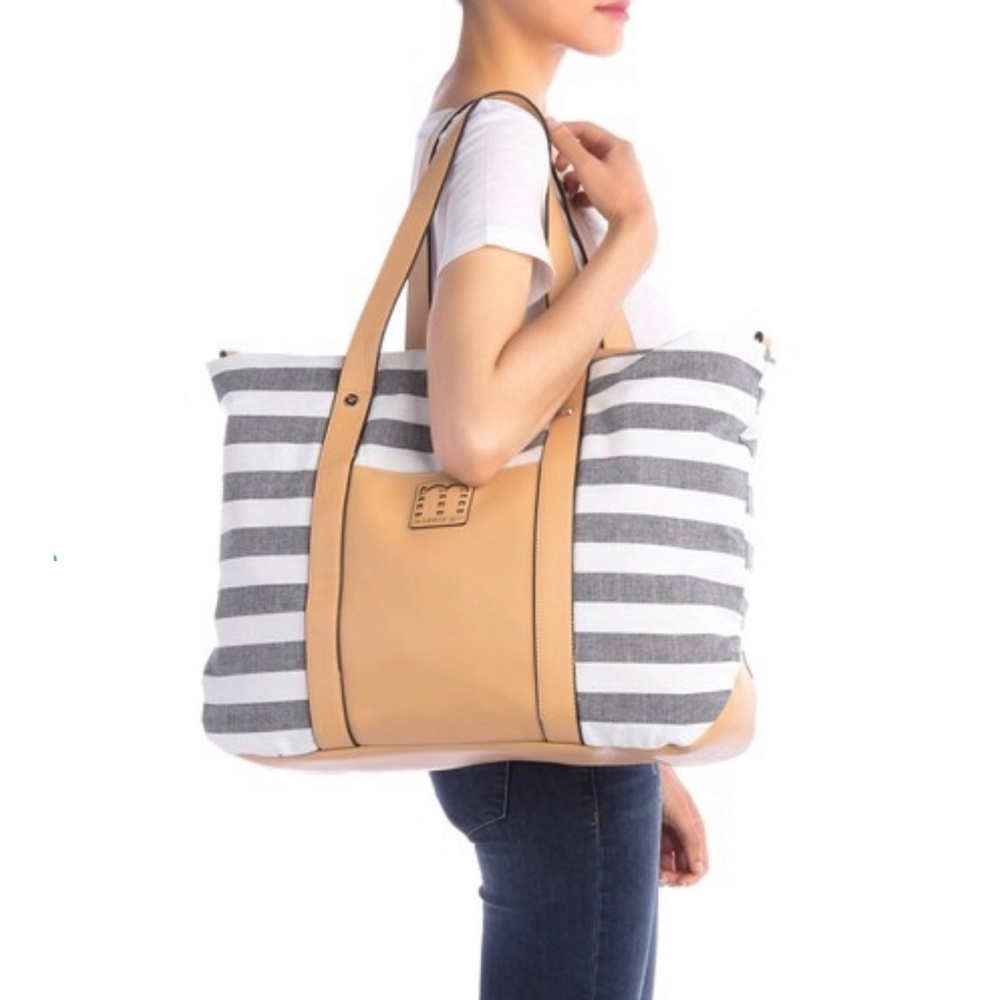 Madden Girl “Weekend at Bae’s” stripe weekend tote